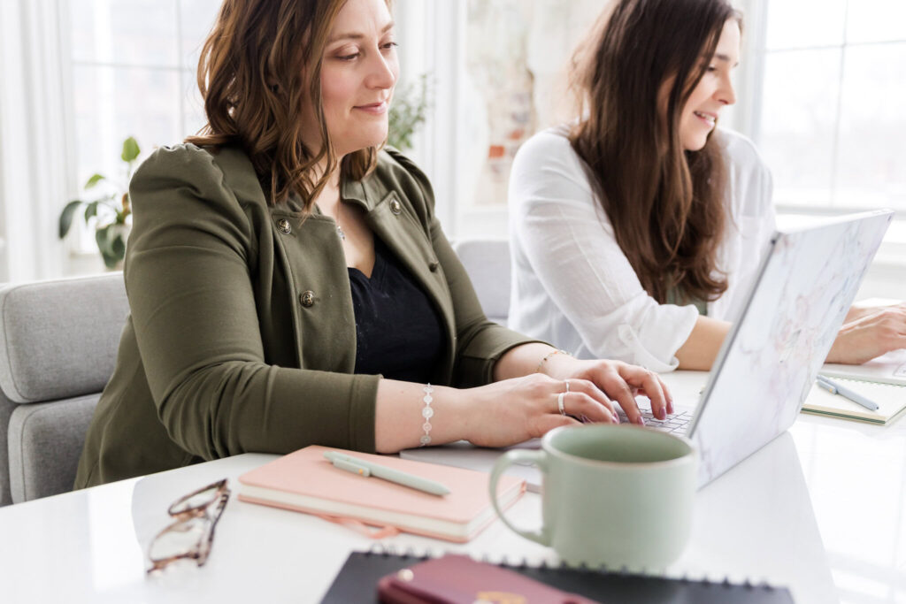 megan and lauren working on seo for personal trainers