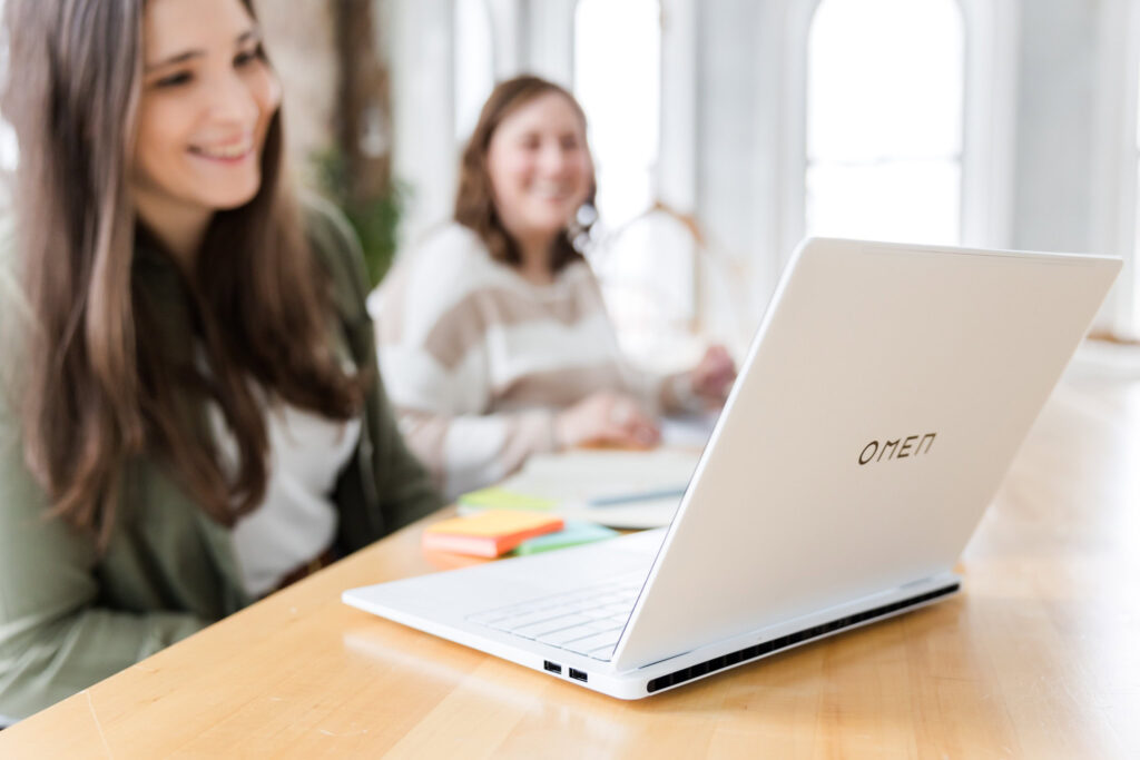 megan and lauren at desk working on seo for cleaning companies