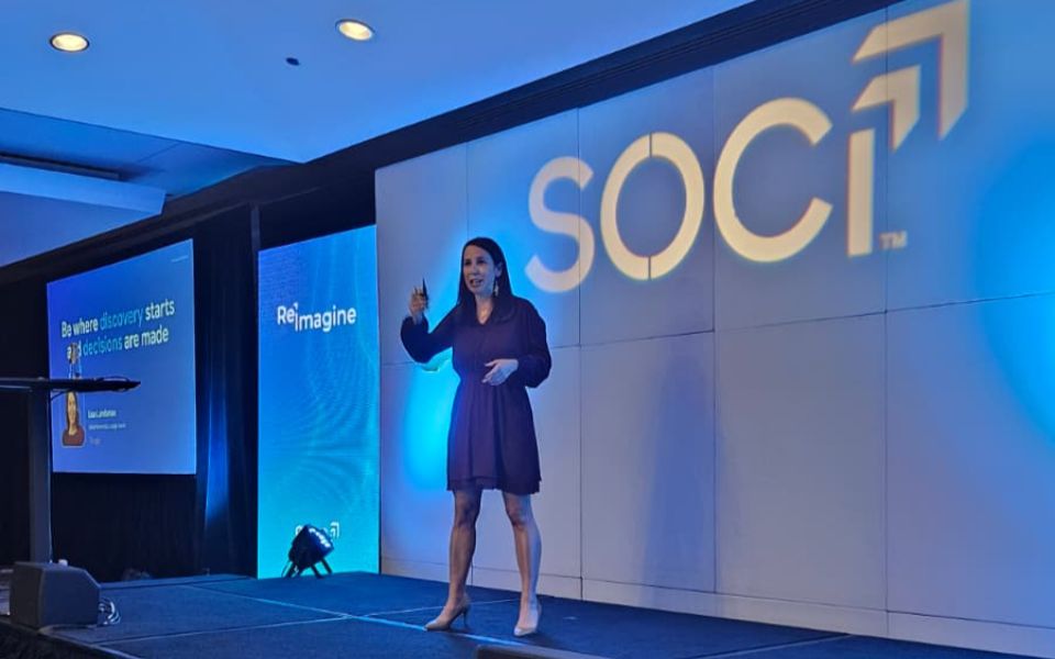 Google's Lisa Landman presents on stage at SOCi Reimagine