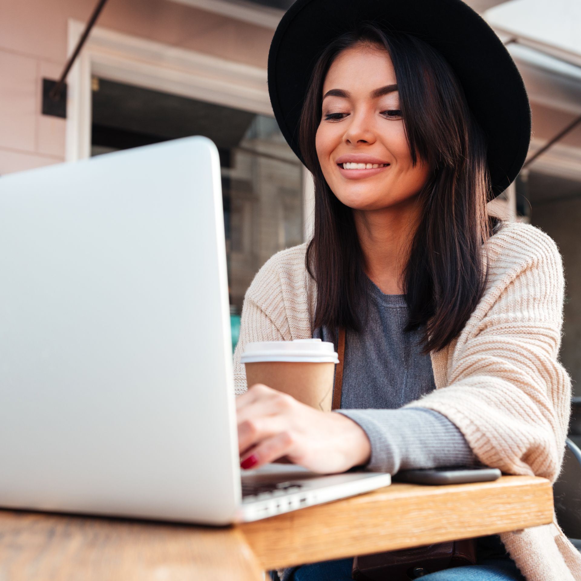 portrait-beautiful-smiling-woman-typing-laptop