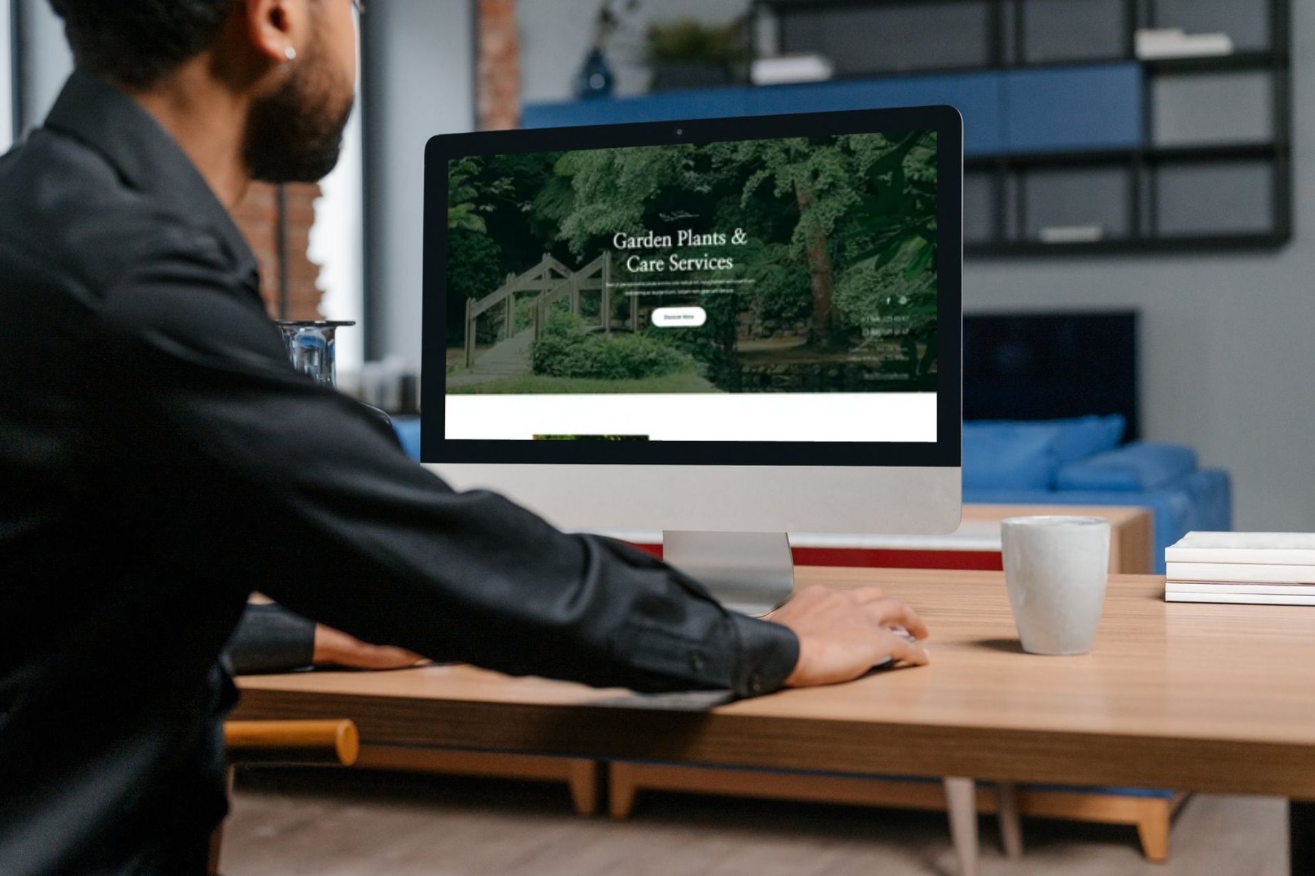 man looking at a landscaping website