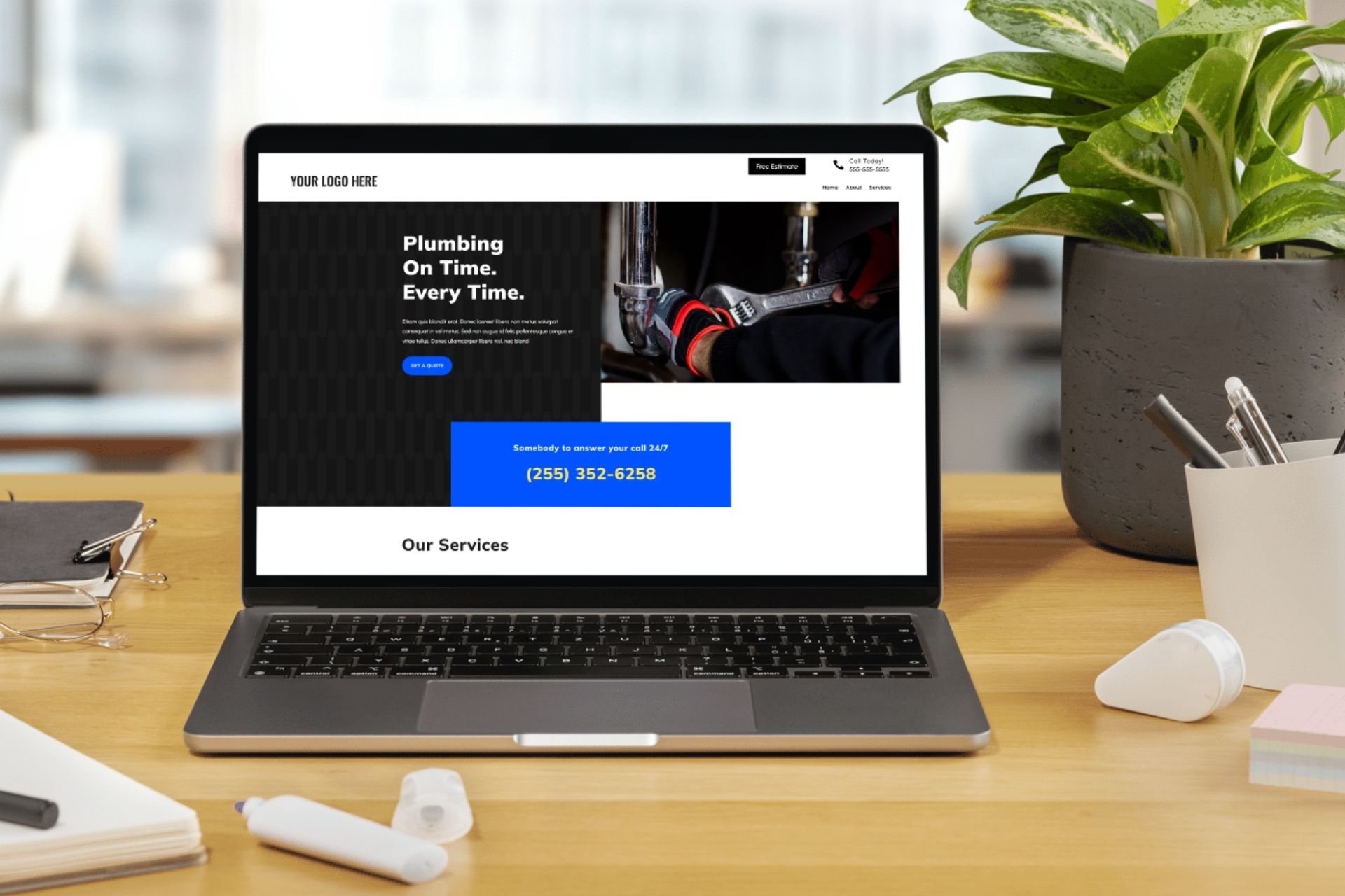laptop showing plumbing website with prominent call CTA