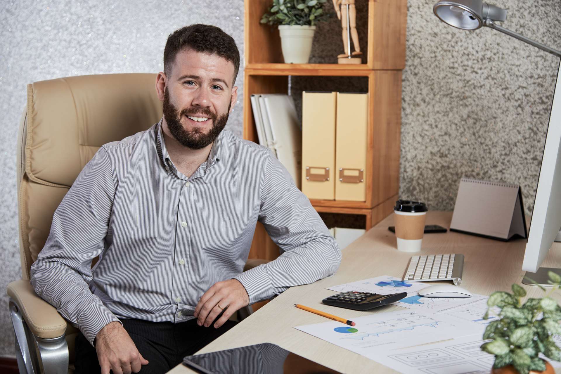 bookkeeper working at his desk
