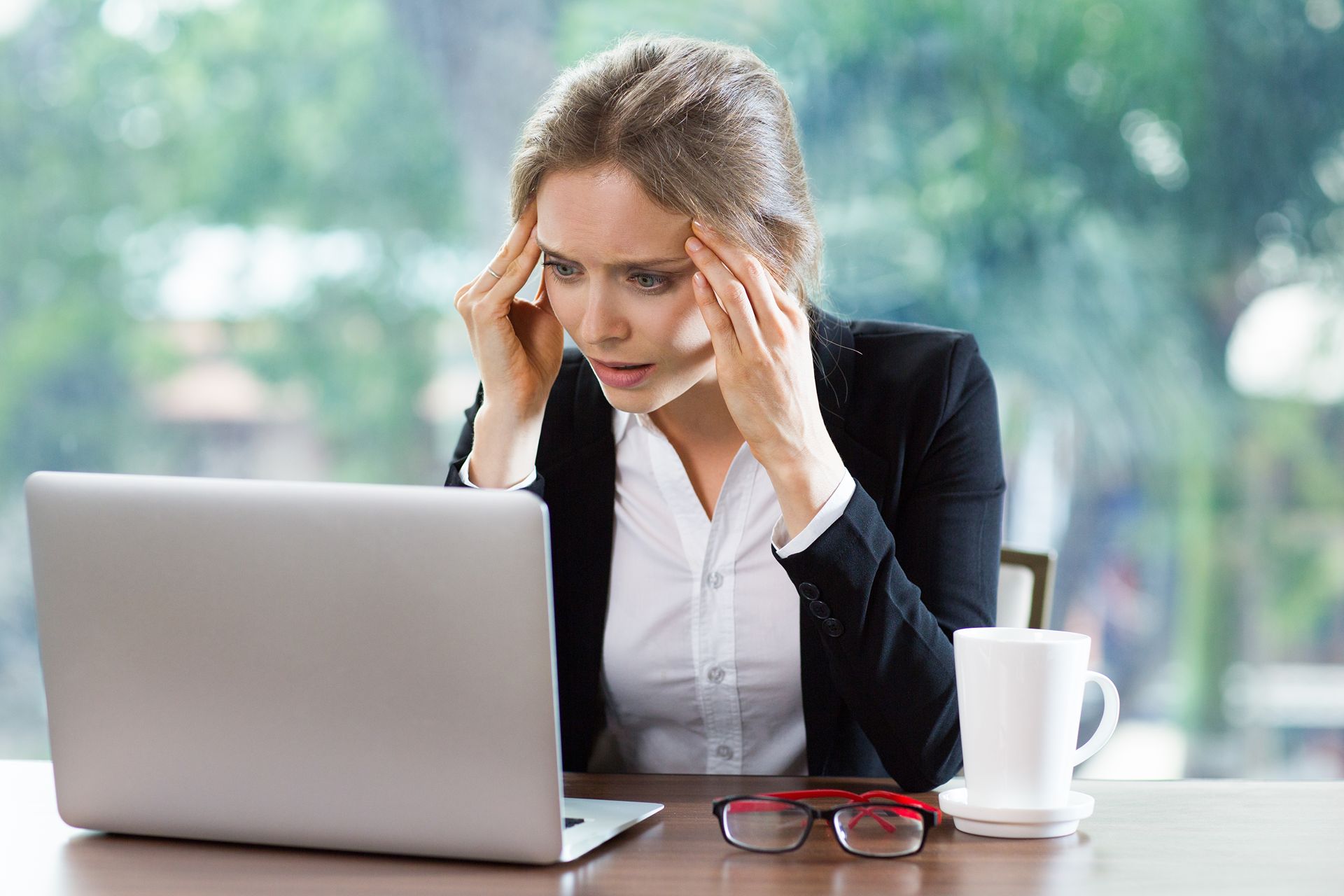 frustrated business office manager trying to figure out multi-location SEO
