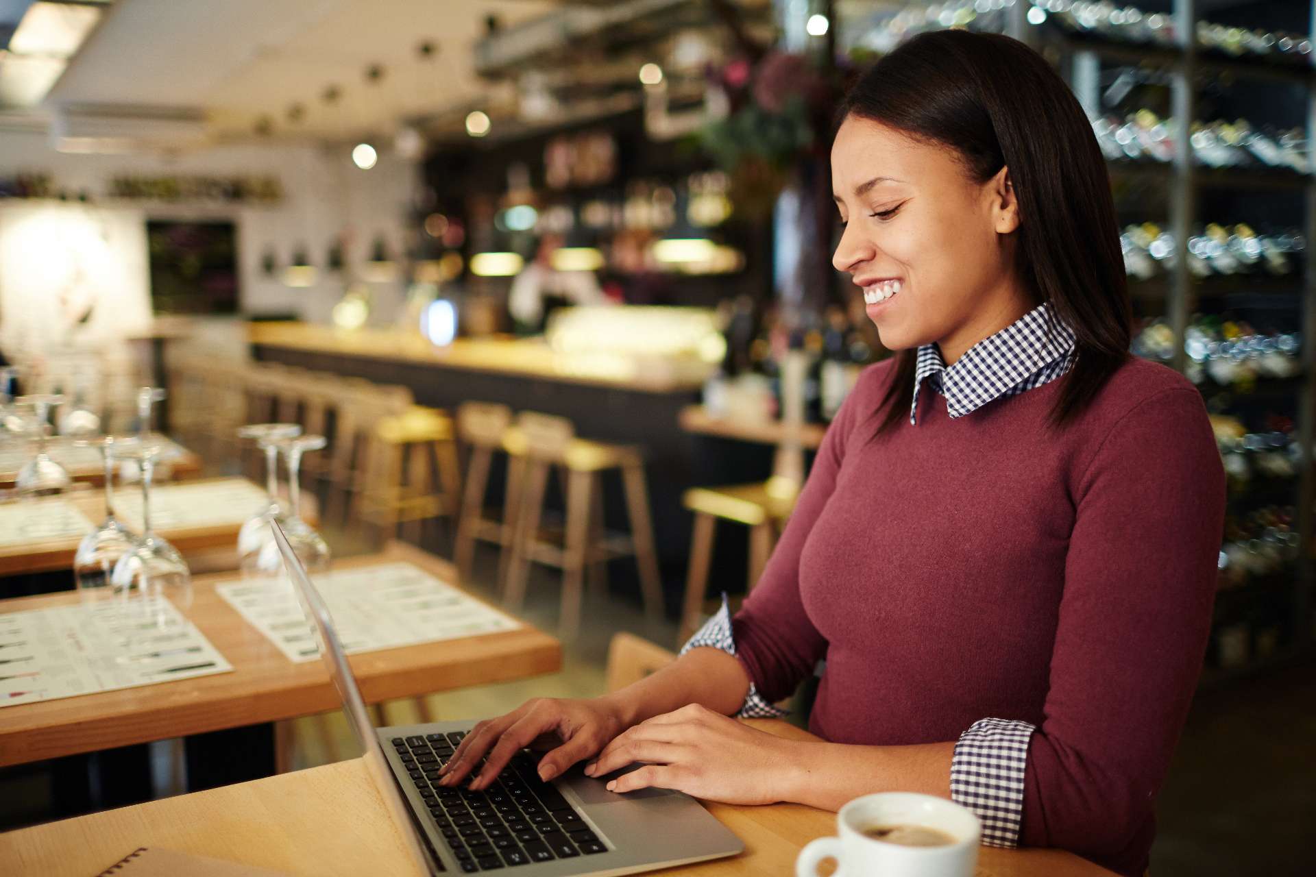 local business owner working on laptop