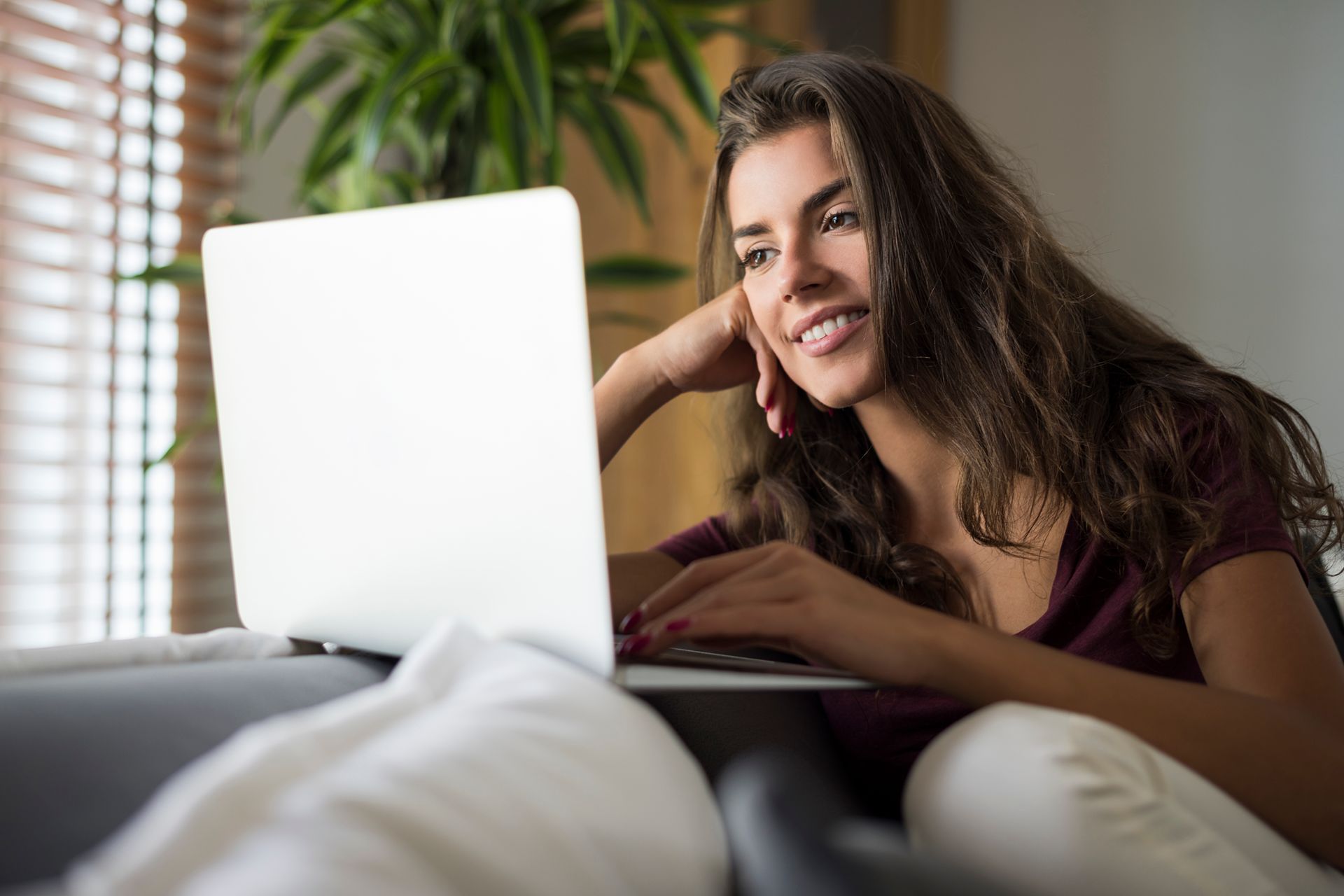 young woman looking online for a med spa