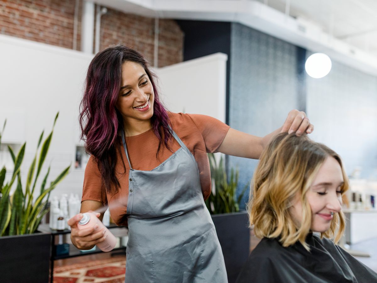 hair salon owner styling hair