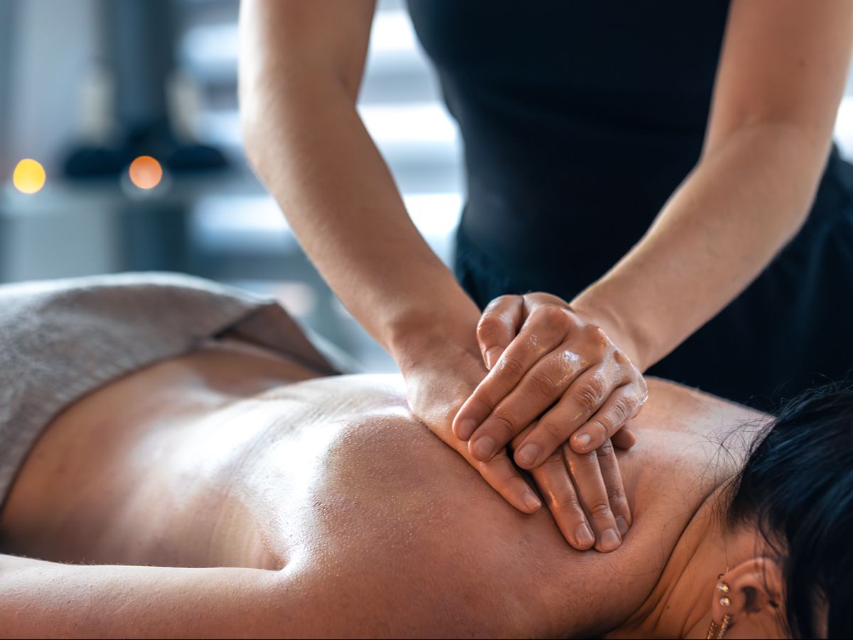 close up of massage therapist giving a massage