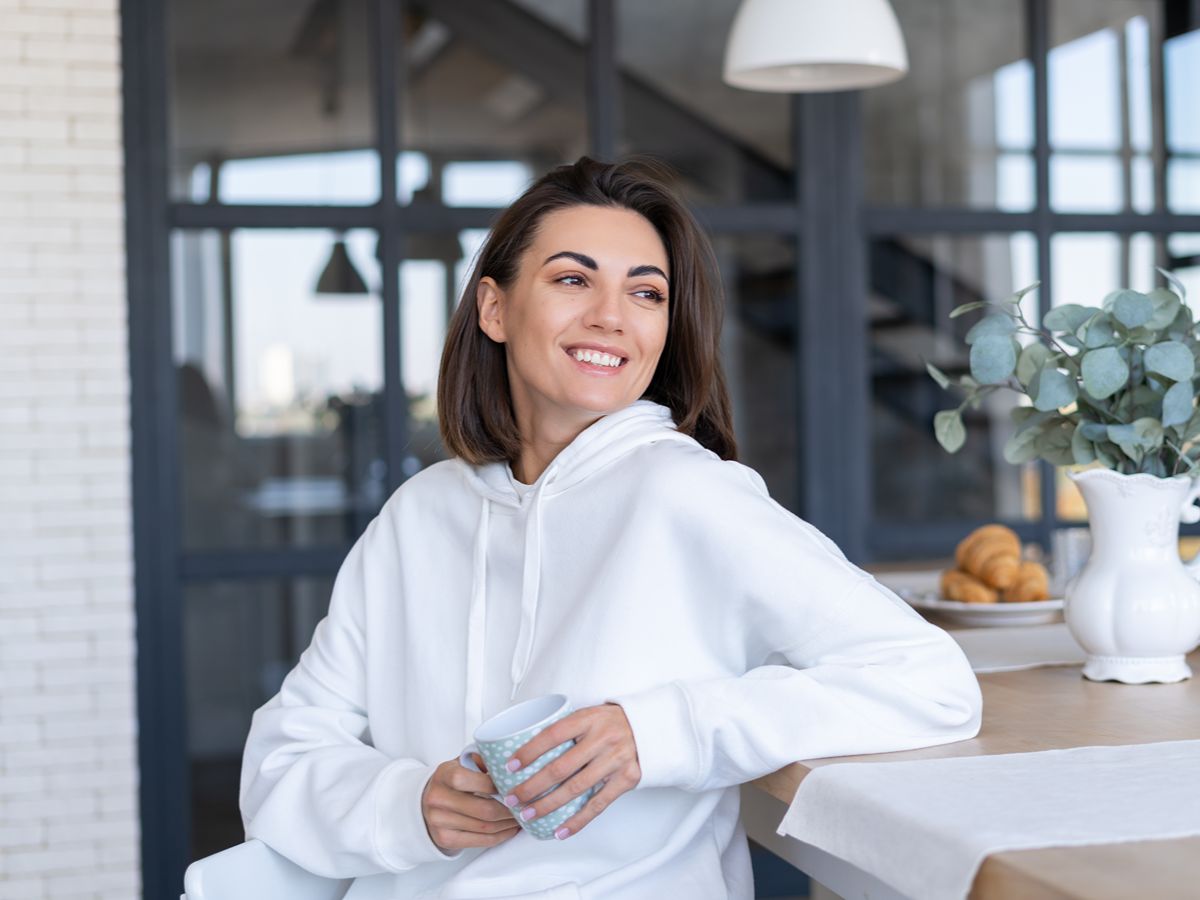 smiling woman enjoying a relaxing spa experience
