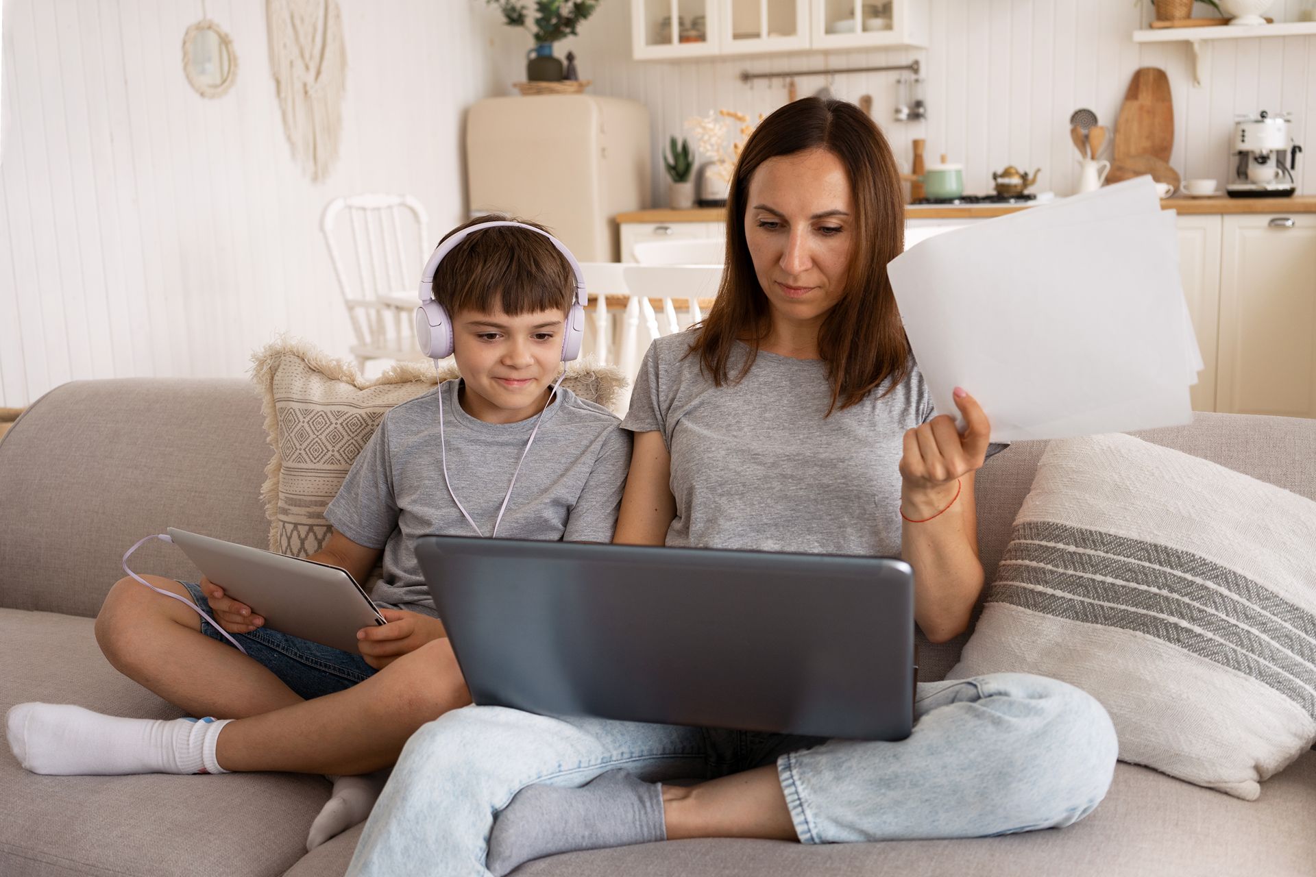 mom searching for a child enrichment program online with her son